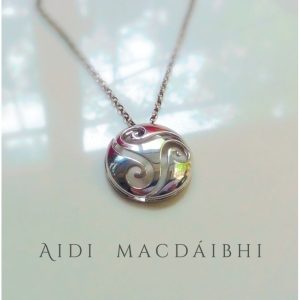 The smooth, polished surface of the pendant is set against the cut-out design of the spirals, This pendant is a true celebration of Celtic heritage and culture, making it a perfect Irish gift for anyone with an appreciation of Irish jewelry and design The smooth, polished surface of the pendant is set against the cut-out design of the spirals, This pendant is a true celebration of Celtic heritage and culture, making it a perfect Irish gift for anyone with an appreciation of Irish jewelry and design