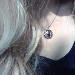 Wear this Celtic triple spiral alone on a delicate chain for a minimalist look, or layer it with other necklaces for a bohemian-inspired style. The versatility of this piece of Irish Jewelry makes it the perfect choice for any occasion, whether dressed u Wear this Celtic triple spiral alone on a delicate chain for a minimalist look, or layer it with other necklaces for a bohemian-inspired style. The versatility of this piece of Irish Jewelry makes it the perfect choice for any occasion, whether dressed u