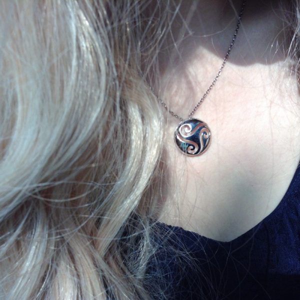 Wear this Celtic triple spiral alone on a delicate chain for a minimalist look, or layer it with other necklaces for a bohemian-inspired style. The versatility of this piece of Irish Jewelry makes it the perfect choice for any occasion, whether dressed u Wear this Celtic triple spiral alone on a delicate chain for a minimalist look, or layer it with other necklaces for a bohemian-inspired style. The versatility of this piece of Irish Jewelry makes it the perfect choice for any occasion, whether dressed u