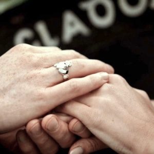 Handcrafted Irish Claddagh | Irish Jewellery| Gold Claddagh ring Photo of this Mans Claddagh ring on finger