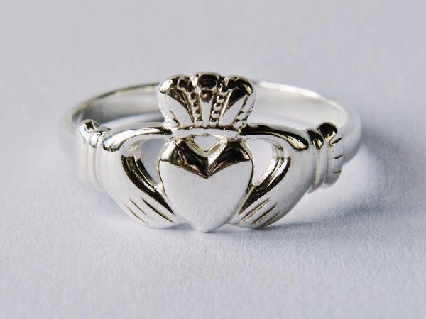Handcrafted Irish Claddagh | Irish Jewellery| Ladies Silver Claddagh ring
Photograph of a Handcrafted ladies Claddagh ring on watercolour paper Handcrafted Irish Claddagh | Irish Jewellery| Ladies Silver Claddagh ring Photograph of a Handcrafted ladies Claddagh ring on watercolour paper
