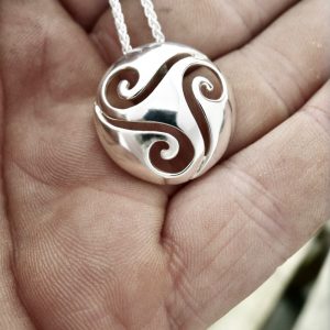 Whether you're treating yourself or someone special, this Celtic Triple Spiral Pendant is sure to become a treasured and timeless addition to any Irish jewelry collection