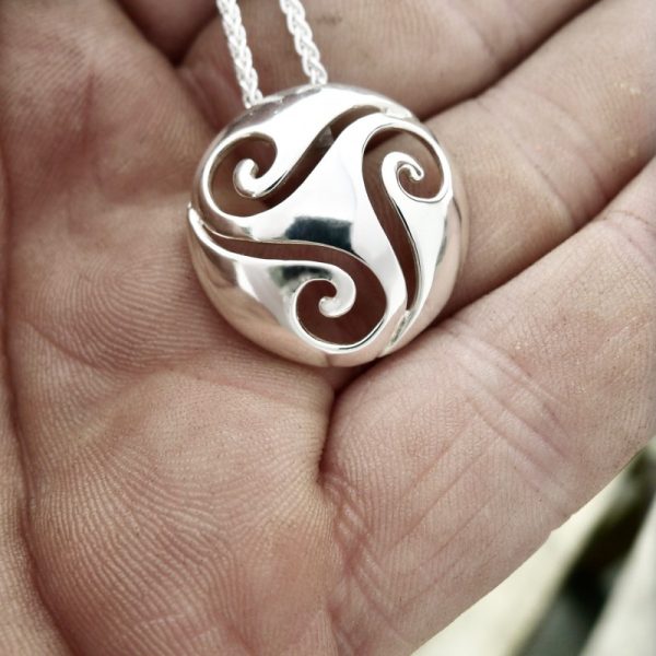 Whether you're treating yourself or someone special, this Celtic Triple Spiral Pendant is sure to become a treasured and timeless addition to any Irish jewelry collection Whether you're treating yourself or someone special, this Celtic Triple Spiral Pendant is sure to become a treasured and timeless addition to any Irish jewelry collection