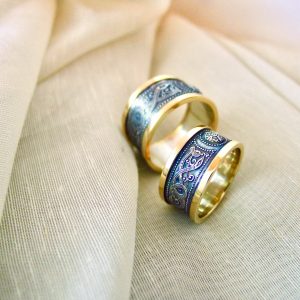 Matching rings 10mm option, with 7mm option. The patina when freshly applied will darken to black over time -- These Celtic rings were photographed just after the patina was applied. Irish jewellery Matching rings 10mm option, with 7mm option. The patina when freshly applied will darken to black over time -- These Celtic rings were photographed just after the patina was applied. Irish jewellery