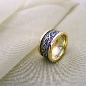 The dark patina when freshly applied has a purple blueish colour that darkens to black over time. Celtic ring |Irish jewellery The dark patina when freshly applied has a purple blueish colour that darkens to black over time. Celtic ring |Irish jewellery