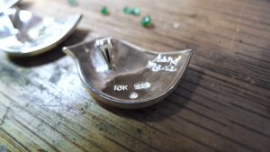 Reverse of the Robin pendant with Irish Jewellery stamps 10K, 925 Handmade and AMD