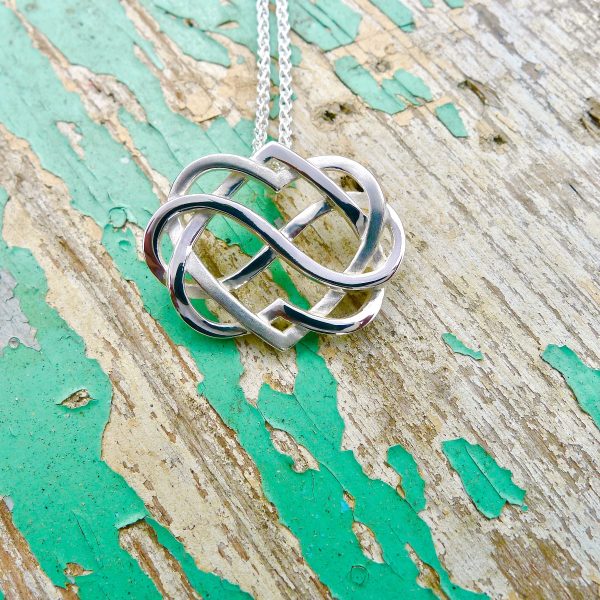 Handcrafted silver Celtic pendant. Irish jewellery design Handcrafted silver Celtic pendant. Irish jewellery design