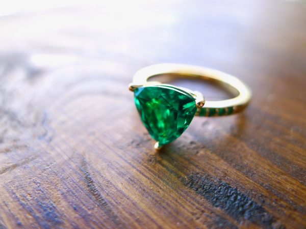 It takes roughly 4 weeks to craft this ring including sourcing the Emerald and fabrication.