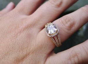 Irish jewellery designer Aidi Mac Dáibhí creates miniature works of art in precious metals.Close-up of an Irish engagement ring in yellow gold Irish jewellery designer Aidi Mac Dáibhí creates miniature works of art in precious metals. Close-up of an Irish engagement ring in yellow gold