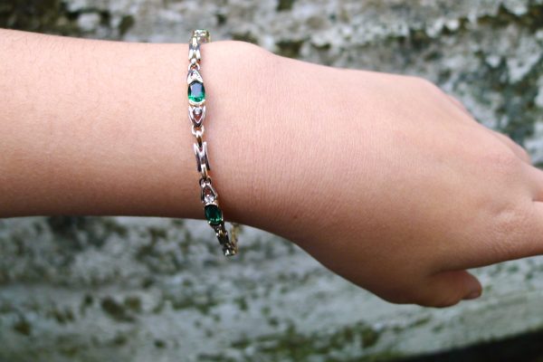 ladies Emerald and diamond bracelet in 14k yellow and white gold ladies Emerald and diamond bracelet in 14k yellow and white gold