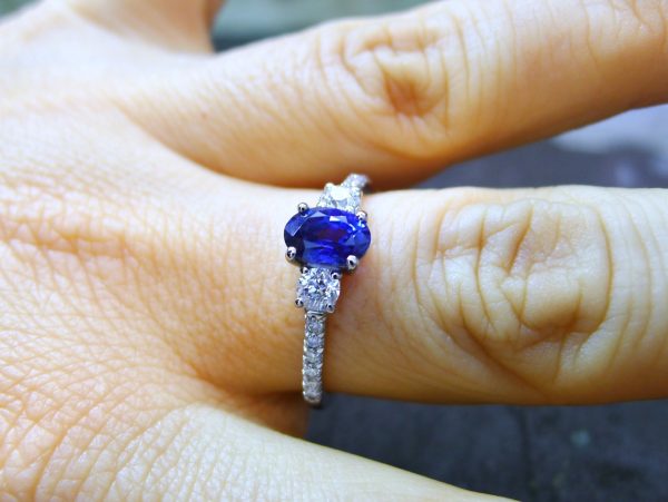 On the finger sapphire and diamond engagement ring On the finger sapphire and diamond engagement ring