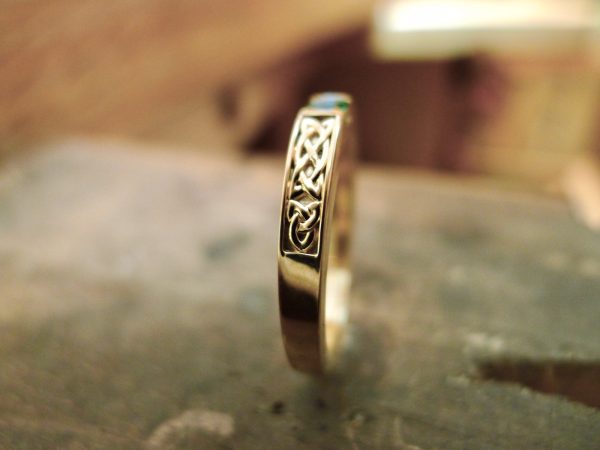 side view and close up of the details. Irish jewellery. Celtic ring side view and close up of the details. Irish jewellery. Celtic ring
