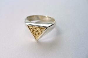 Irish jewellery crafted in Ireland and shipped worldwide for free. Gold panel inlaid into silver. Celtic Ring