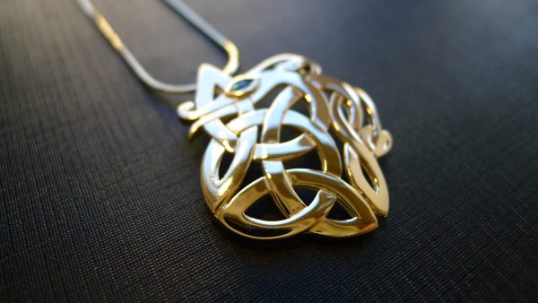 Celtic dragon in gold. Kenmare Irish jewellery Celtic dragon in gold. Kenmare Irish jewellery