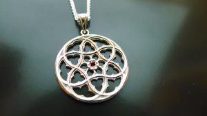 Crafted in sterling silver with your choice of gemstone and chain length