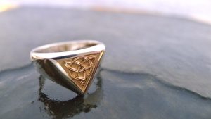 Handcrafted Irish Jewellery Design | Irish Jewellery| Silver Celtic ring with a triangle panel of Irish gold Photograph of a Handcrafted Irish gold and silver Celtic ring