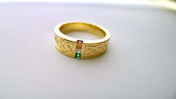 Perhaps you're looking to make a statement or just want to add a touch of class to your daily wear, this Men's Channel Set Celtic Knotwork Ring is the perfect choice. So, show off your unique style and love for all things Irish with this handcrafted piece Perhaps you're looking to make a statement or just want to add a touch of class to your daily wear, this Men's Channel Set Celtic Knotwork Ring is the perfect choice. So, show off your unique style and love for all things Irish with this handcrafted piece