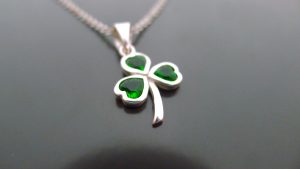 Close up of an Irish jewellery design. Shamrock necklace in silver Close up of an Irish jewellery design. Shamrock necklace in silver