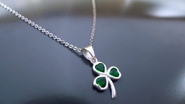 Sterling silver Shamrock necklace with green crystal glass and an 18 inch silver chain. This piece of Irish jewellery is crafted her in Ireland Sterling silver Shamrock necklace with green crystal glass and an 18 inch silver chain. This piece of Irish jewellery is crafted her in Ireland