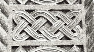 Details from stone carvings on a Celtic cross in Ireland Details from stone carvings on a Celtic cross in Ireland