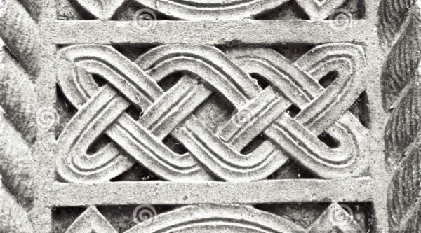 Details from stone carvings on a Celtic cross in Ireland Details from stone carvings on a Celtic cross in Ireland